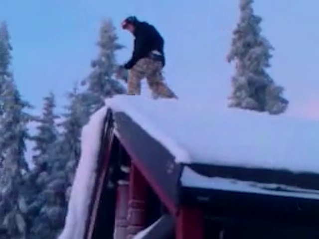 Video Reference: Snow, Roof, Winter, Freezing, Tree, Extreme sport, Ice, Fun, Recreation, Vehicle, Person, Outdoor, Jumping, Air, Man, Riding, Hill, Covered, Skiing, Flying, Red, Slope, Doing, Board, Trick, Truck, White, Standing, Mountain, Sky, Cold