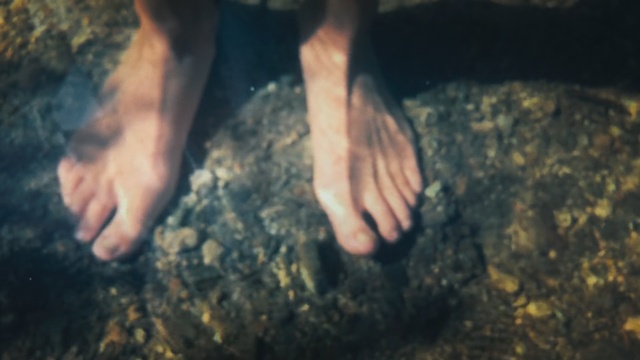 Video Reference: Hand, Leg, Barefoot, Water, Tree, Foot, Sky, Human body, Rock, Finger, Person