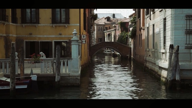 Video Reference: waterway, canal, body of water, water, town, channel, gondola, street, city, alley