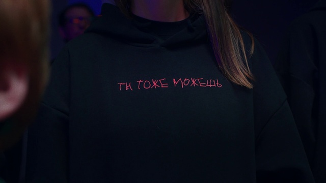 Video Reference: Black, Clothing, T-shirt, Blue, Text, Product, Purple, Pink, Sleeve, Magenta