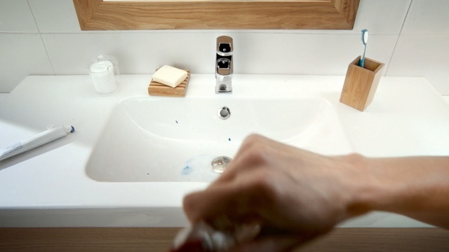 Video Reference: sink, tap, plumbing fixture, bathroom sink, bathroom, bathtub, ceramic, angle, Person