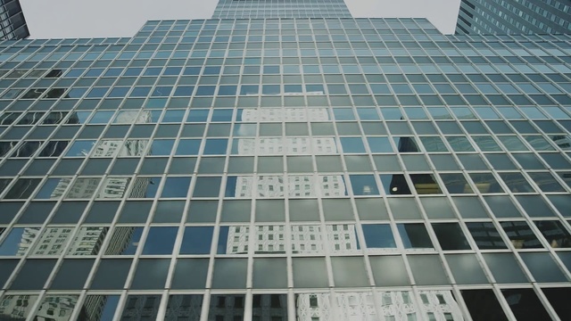 Video Reference: Architecture, Daytime, Commercial building, Urban area, Metropolitan area, Tower block, Skyscraper, Building, Condominium, Human settlement