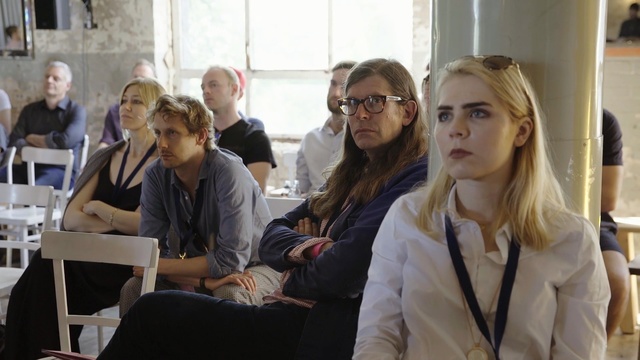 Video Reference: woman, man, people, chair, glasses, old man, window, room, Person
