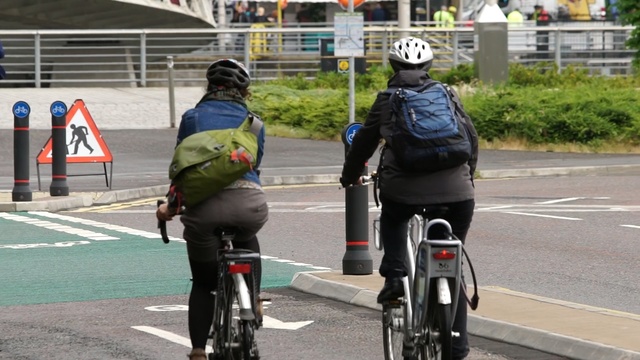 Video Reference: cycling, lane, bicycle, road bicycle, vehicle, mode of transport, bicycle racing, sports equipment, cycle sport, bicycle accessory, Person