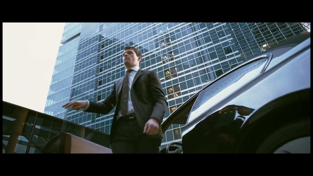Video Reference: Automotive design, Gentleman, Mid-size car, Vehicle, Luxury vehicle, Businessperson, Car, Photography, White-collar worker, Person, Indoor, Man, Front, Young, Looking, Computer, Standing, Laptop, Playing, Woman, Using, Wearing, Suit, Table, Screen, Holding, Desk, Girl, Large, Room, Ball, White, Game, Clothing, Text