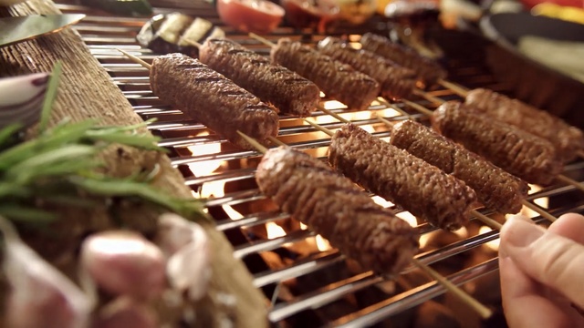 Video Reference: Cuisine, Barbecue, Food, Skewer, Dish, Yakitori, Grilling, Kebab, Arrosticini, Shashlik, Person