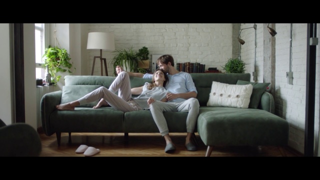 Video Reference: Couch, Furniture, Living room, Room, Sofa bed, Leg, Interior design, Sitting, Comfort, Table