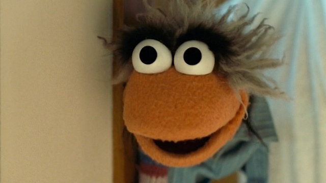 Video Reference: Stuffed toy, Toy, Plush, Hair, Facial expression, Head, Textile, Nose, Organ, Eye