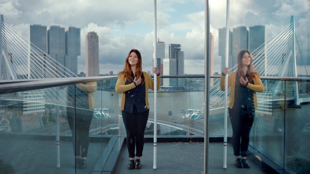 Video Reference: urban area, snapshot, photography, water, fun, girl, sky, city, skyscraper, building, Person