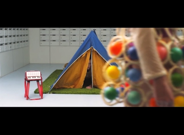 Video Reference: play, triangle, fun, toy, cone, square, space, leisure, symmetry, Person