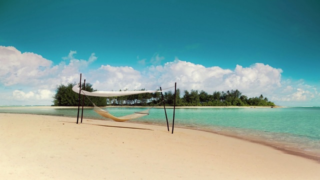 Video Reference: volleyball net, net, game equipment, beach, sand, equipment, sea, ocean, island, water, vacation, travel, landscape, coast, sky, shore, holiday, tropical, summer, sport, paradise, wave, coastline, Person