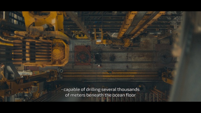 Video Reference: Font, Screenshot, Pc game, Machine, Metal, Indoor, Sitting, Room, Large, Man, Old, Display, Yellow, Train, Bus, Holding, Oven, Standing, White, Kitchen, Riding, Street, Stacked, Truck, Fire, People, Text, Video game