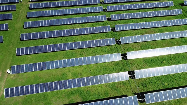 Video Reference: Green, Sport venue, Stadium, Line, Architecture, Grass, Urban design, Landscape, Land lot, Plant, Fabric, Building