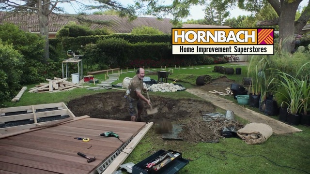 Video Reference: plant, grass, yard, tree, backyard, outdoor structure, landscape, lawn, garden, landscaping