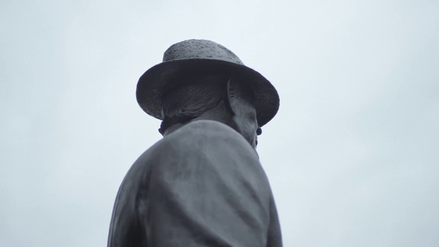 Video Reference: White, Standing, Hat, Headgear, Fedora, Sun hat, Temple, Photography, Fashion accessory, Gentleman