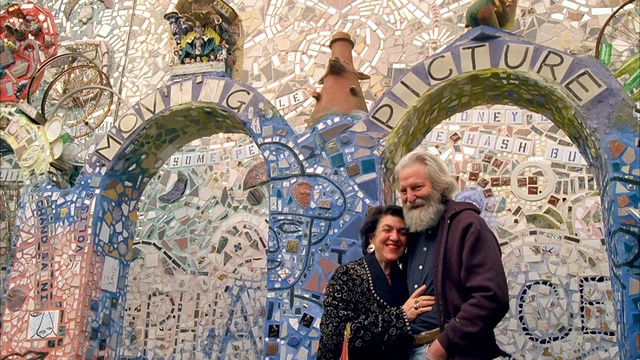 Video Reference: tree, tourism, arch, flower, art, plant, winter, building, window, Person