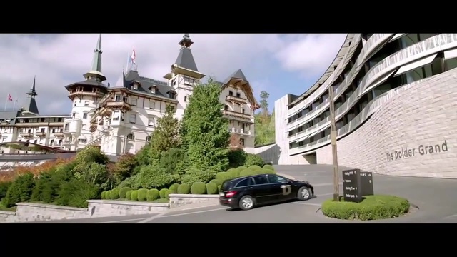Video Reference: Landmark, Architecture, Residential area, Metropolitan area, Building, Property, Mode of transport, Vehicle, Condominium, Car