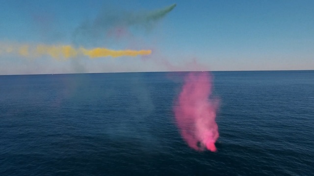 Video Reference: sea, ocean, water, horizon, sky, geological phenomenon, calm, wind wave, marine mammal, wave, Person
