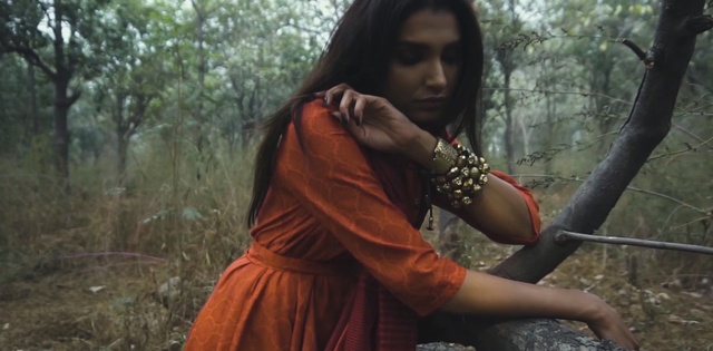 Video Reference: tree, girl, abdomen, forest, trunk, temple, jungle, grass, tribe, Person