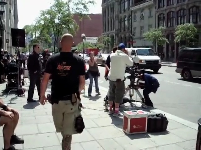 Video Reference: vehicle, car, public space, street, segway, mode of transport, pedestrian, asphalt, city, recreation