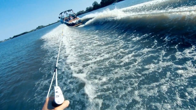 Video Reference: Vehicle, Boat, Surface water sports, Yacht, Boating, Luxury yacht, Recreation, Water transportation, Towed water sport, Watercraft, Person