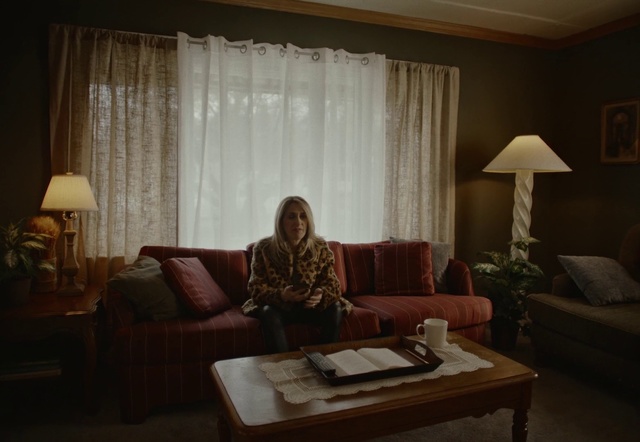 Video Reference: Curtain, Room, Window treatment, Interior design, Furniture, Living room, Property, Window covering, Lighting, Textile