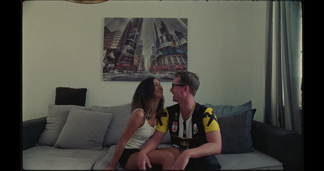 Video Reference: Room, Couch, Blond, Fun, Leg, Mouth, Thigh, Furniture, Vacation, Black hair
