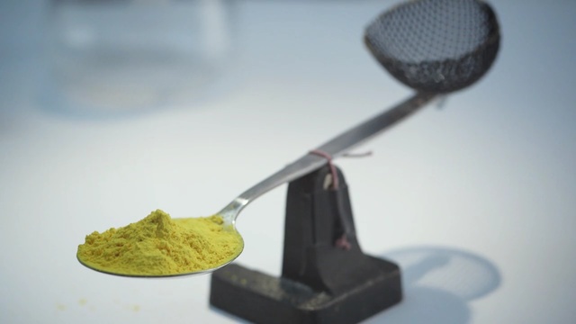 Video Reference: goldberg machine, close up, scales, balance