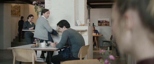 Video Reference: Room, Interior design, Table, Conversation, Furniture, Restaurant, Office, Desk, Building, Art