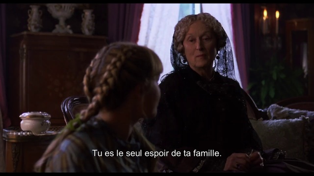 Video Reference: Human, Adaptation, Interaction, Conversation, Screenshot, Scene, Darkness, Smile, Movie, Person, Indoor, Woman, Sitting, Window, Front, Man, Table, Looking, Holding, Cellphone, Young, Phone, Standing, Glasses, Food, Laptop, Girl, Shirt, Computer, Room, White, Kitchen, Human face, Clothing