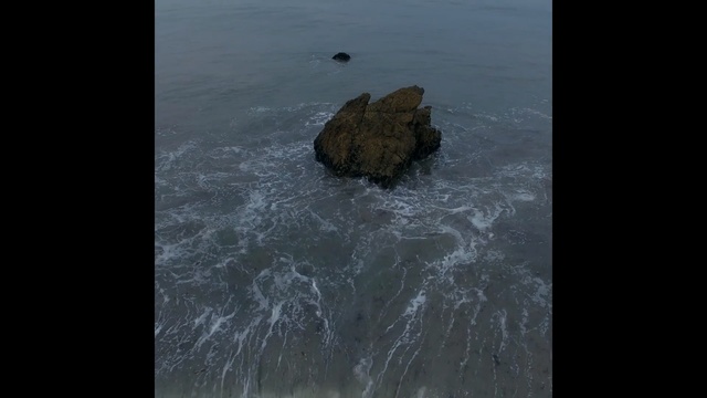 Video Reference: water, rock, sea, sky, geological phenomenon, wave, ocean, terrain, cliff, coast