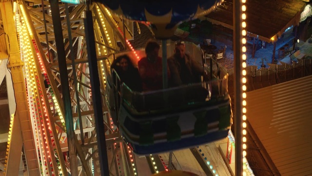 Video Reference: Amusement ride, Amusement park, Fair, Night, Recreation, Fun, Nonbuilding structure, Carousel, Tourist attraction, Park