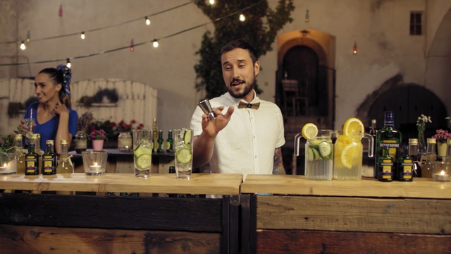 Video Reference: drink, distilled beverage, alcoholic beverage, liqueur, alcohol, bar, wine, Person
