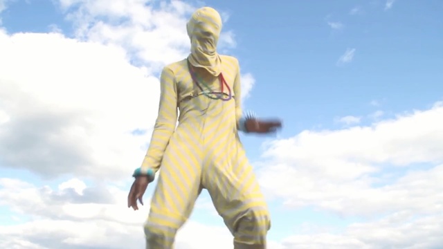 Video Reference: Yellow, Standing, Anime, Action figure, Costume, Fictional character, Statue, Animation
