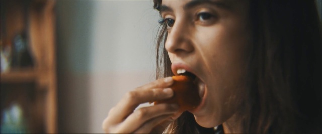 Video Reference: Nose, Lip, Mouth, Close-up, Photography, Singer, Singing, Junk food, Eating, Portrait, Person, Indoor, Teeth, Man, Brushing, Wearing, Food, Young, Brush, Shirt, Bite, Mirror, Pizza, Holding, Standing, Blue, White, Face, Human face, Music, Girl, Eyes, Lipstick, Male