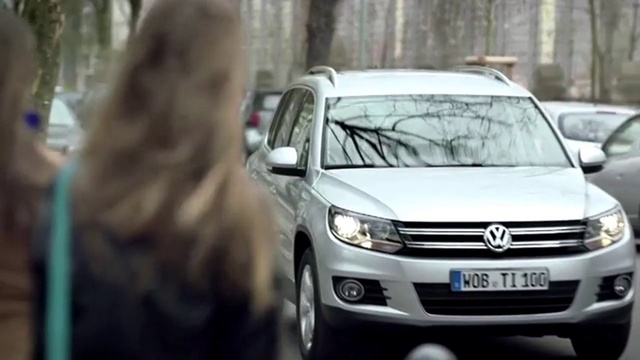Video Reference: Land vehicle, Vehicle, Car, Volkswagen, Volkswagen tiguan, Crossover suv, Automotive design, Infrastructure, Luxury vehicle, Subcompact car