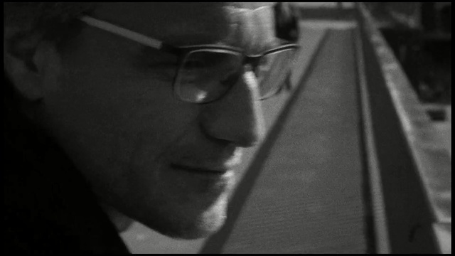 Video Reference: black, white, face, eyewear, photograph, man, black and white, person, monochrome photography, nose