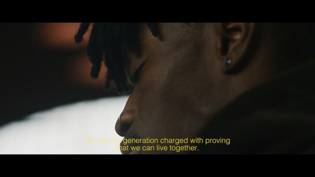 Video Reference: face, nose, darkness, mouth, screenshot, human, midnight, computer wallpaper, font, Person