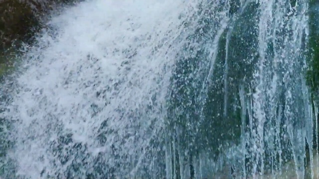 Video Reference: Water resources, Water, Nature, Waterfall, Watercourse, Nature reserve, Freezing, Rapid, Water feature, Geological phenomenon, Outdoor, Surfing, Wave, Riding, Man, Young, Standing, Woman, Suit, Board, Ocean, Wet, Large, White, People, Group, Snow