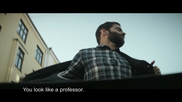 Video Reference: sitting, photography, facial hair, fun, song, cool, gentleman, screenshot, conversation, official