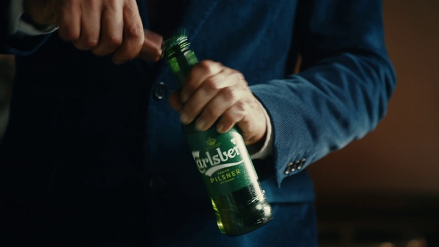 Video Reference: Alcohol, Bottle, Green, Drink, Liqueur, Beer bottle, Hand, Distilled beverage, Finger, Glass bottle