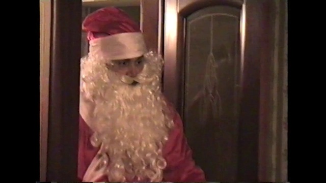 Video Reference: Santa claus, Fictional character, Dress, Facial hair, Fur, Beard, Gown, Christmas, Costume