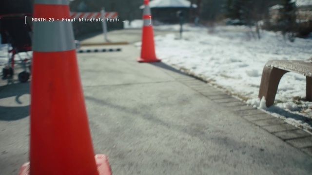 Video Reference: Red, Snow, Cone, Public space, Winter, Line, Road, Asphalt, Road surface, Freezing