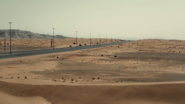 Video Reference: Natural environment, Sand, Desert, Ecoregion, Sky, Landscape, Line, Road, Horizon, Plain