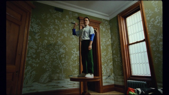 Video Reference: Standing, Room, Interior design, Window, Textile, Architecture, Curtain, Furniture, Window treatment, Interior design