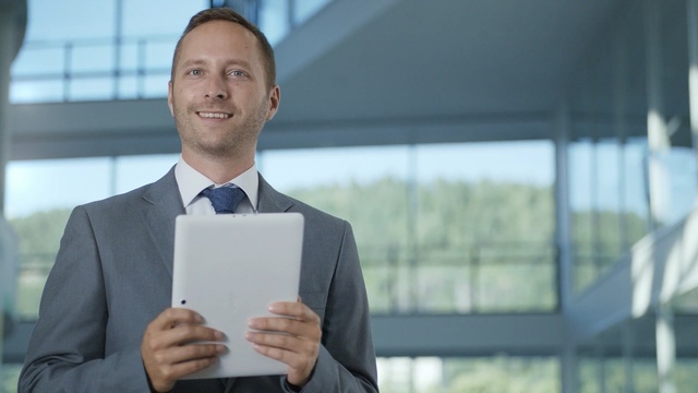 Video Reference: suit, businessperson, white collar worker, business, technology, formal wear, job, management, energy, Person