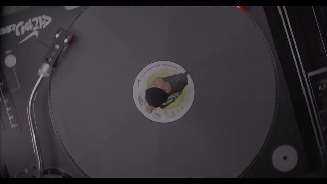 Video Reference: technology, compact disc, data storage device, screenshot, sound, electronic device, space, circle, darkness, computer wallpaper, Person