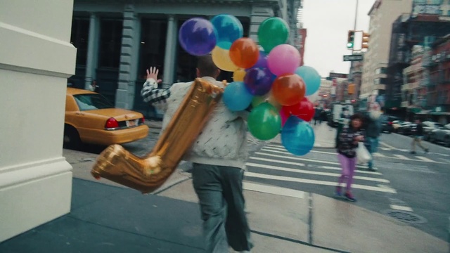Video Reference: Balloon, Party supply, Snapshot, Mode of transport, Fun, Pedestrian, Street, Toy, Architecture, Leisure