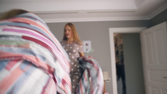 Video Reference: Room, Pink, Fashion, Dress, Textile, Long hair, Interior design, Bedroom, Closet, Costume