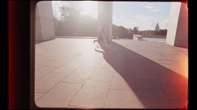Video Reference: floor, shadow, flooring, line, sunlight, wood, angle, sky, concrete, tile